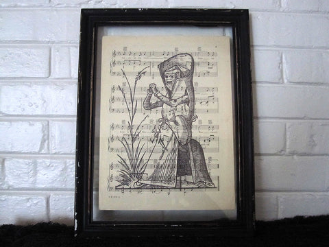 Vintage Halloween Figure Art Print on Vintage Music Sheet