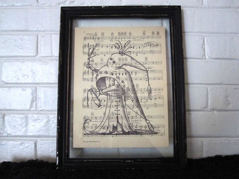 Vintage Halloween Figure Art Print on Vintage Music Sheet