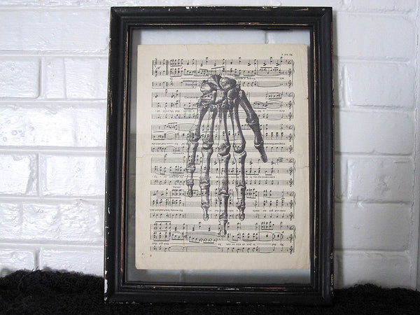 Skeleton Hand Art Print on Vintage Music Sheet