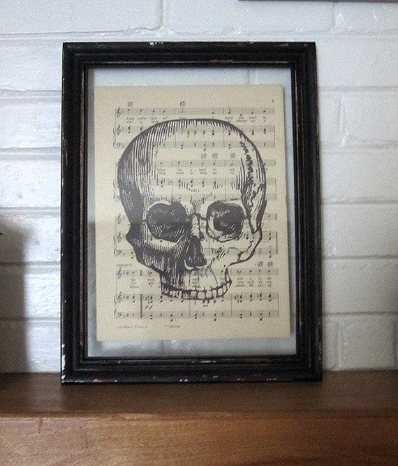 Skull Without Jaw Art Print on Vintage Music Sheet